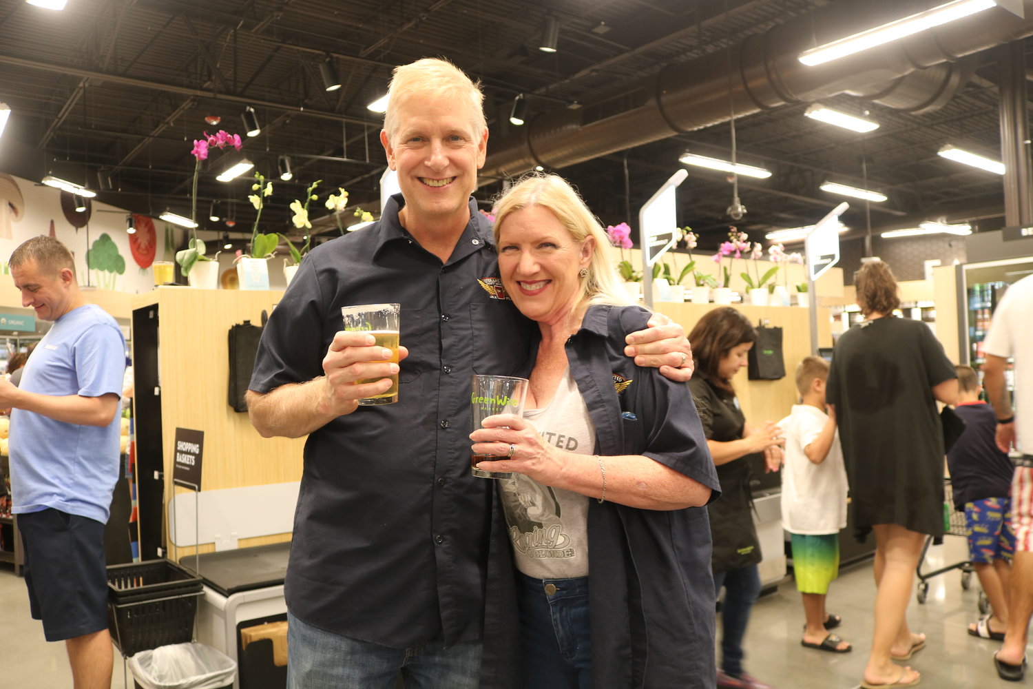 Ron Gamble, founder and brew master of Veterans United, and Sheryl Gamble, co-founder and charity coordinator of Veterans United, attend the one-year celebration for GreenWise's Nocatee location.
